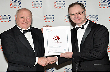 Tony Priest is presented with his award