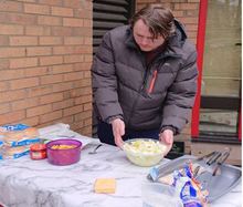 Leslie preparing salad