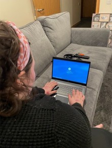 Vikkie using her new laptop 2